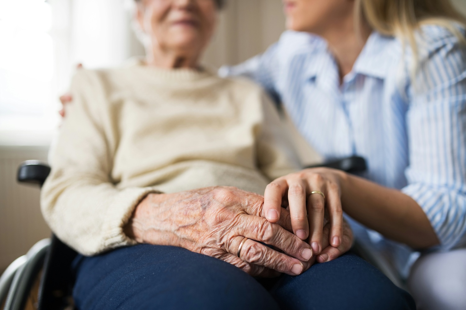 elderly woman and caregiver
